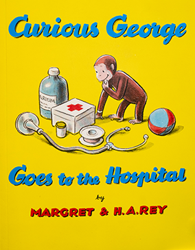 yellow book cover of Curious George with a monkey playing with doctor tools